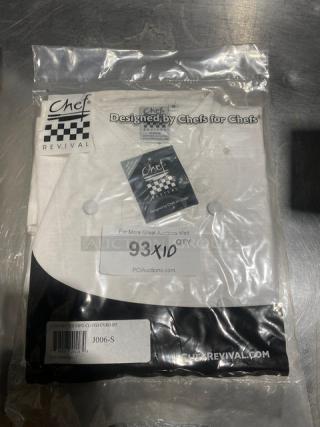 Chef Revival J006-S white chef coat, size S, in new packaging. Features include button front and "Designed by Chefs for Chefs" label.