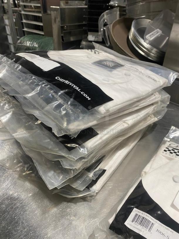 New Chef Revival J006-S chef coat in sealed packaging. White, size S. Brand label and model visible for authenticity.