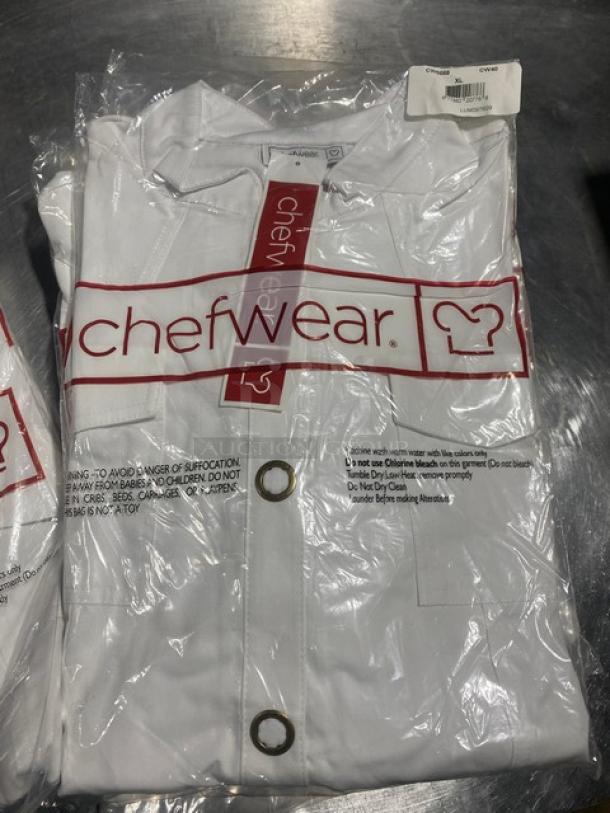Chefwear white women's chef jacket, XL, model CW5668-CW40, with ring snap buttons, new in packaging.