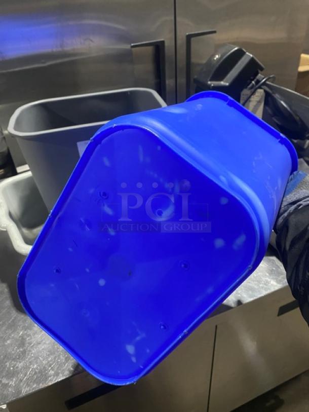 Assorted waste bin set featuring a blue utility bucket and bus box. Durable construction, ideal for commercial use.