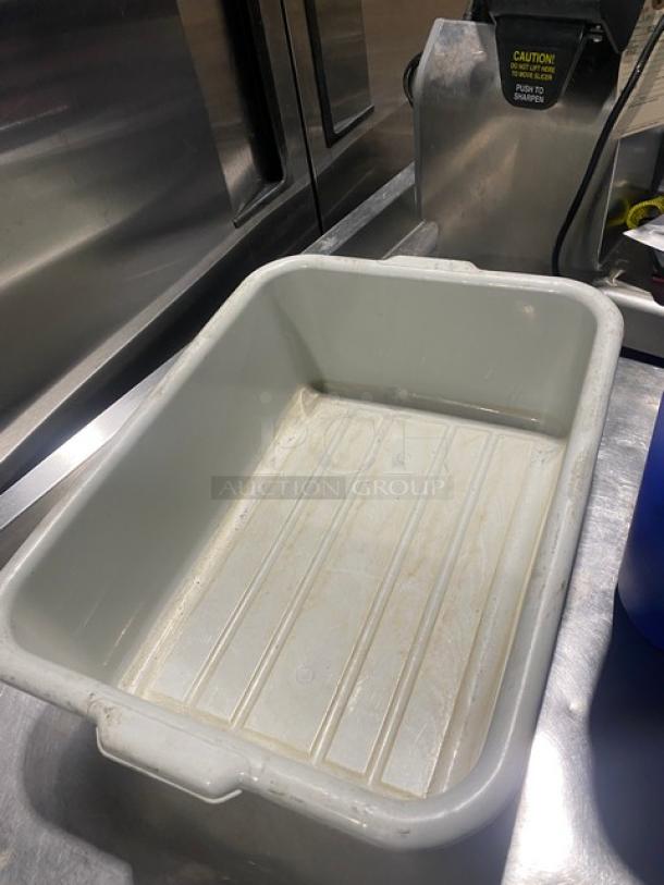 Commercial utility bucket/bus box in good condition, white plastic, ribbed interior, handles on sides, suitable for waste or transport tasks.