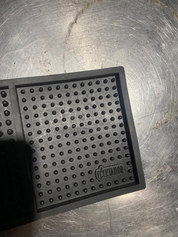 Cocktailor commercial black non-slip bar mat, features raised squares, brand logo visible, ideal for commercial use.