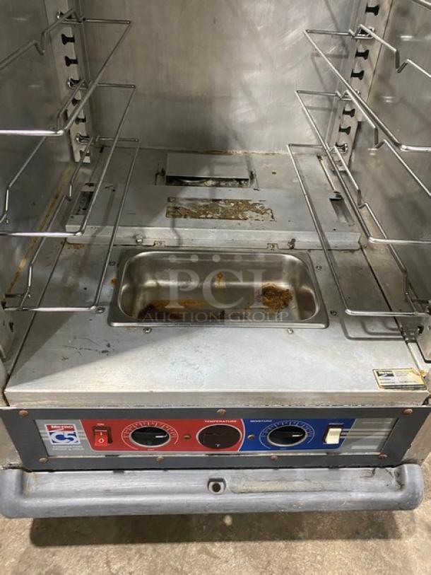 Metro C5-1 Series electric heated holding cabinet, model C519-CFC-U, with glass door, pan slide, on casters, 120V, interior view.