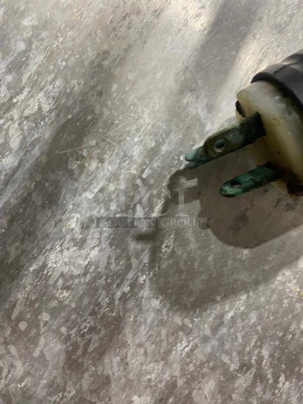 Electric plug close-up for Metro C5-1 Series Single Glass Door Heated Cabinet, Model C519CFCU, showing current condition.