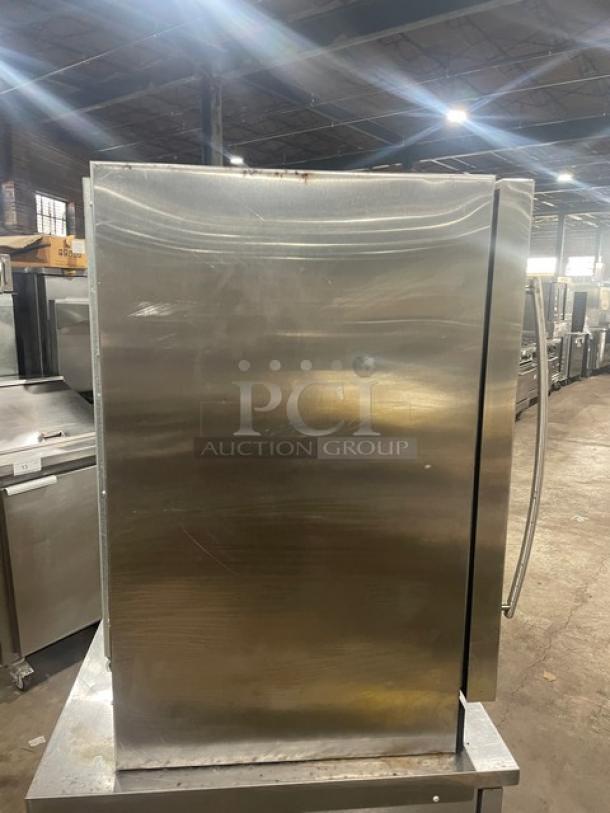 U-Line stainless steel single glass swing door reach-in merchandiser, model U-2075WCS-00, in commercial condition.