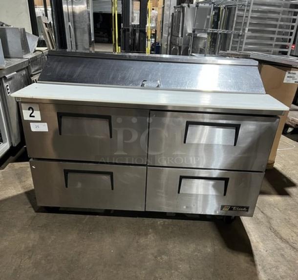 True Stainless Steel 4 Drawer Refrigerated Bain Marie Prep Table with cutting board, Model TSSU-60-16D-4, on casters.