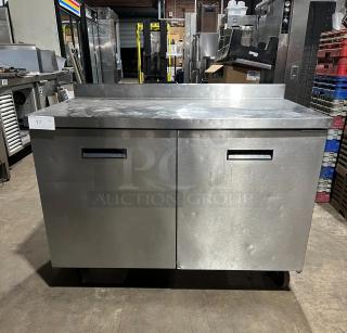 Randell 2-door stainless steel worktop refrigerator, model 93027, on casters. Commercial-grade, flat-top design.