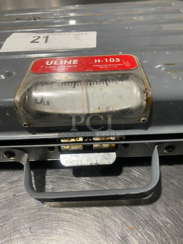 Rubbermaid Pelouze analog shipping scale, Model FG4100UD, 100 lb capacity, briefcase-style, used condition.