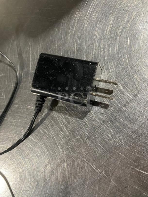 Power adapter for CDN Commercial 22 Lb. Digital Weight Scale, Model SD2206. Black with visible wear.