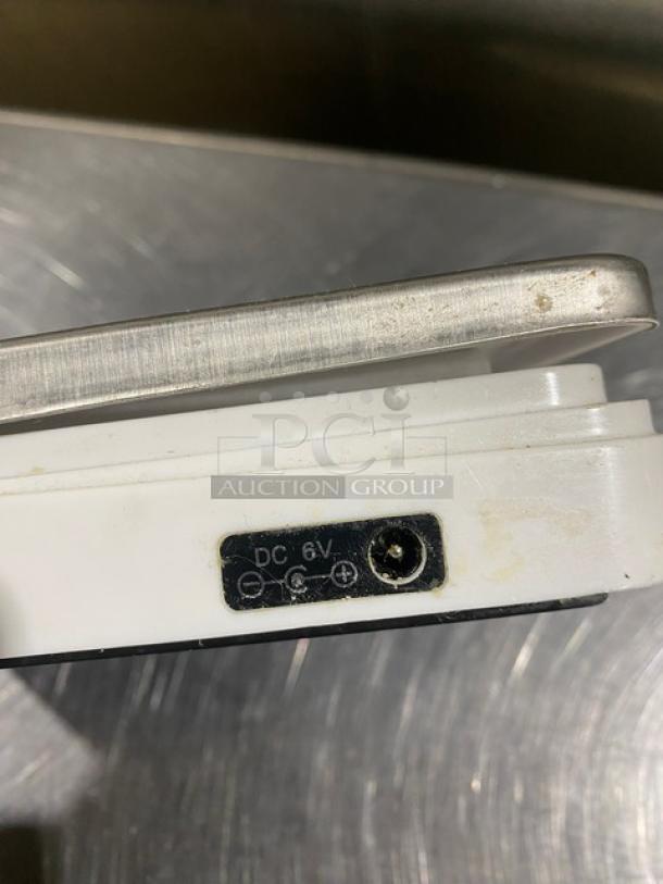 CDN Commercial 22 lb. Digital Weight Scale, Model SD2206, shows DC 6V power input, stainless steel platform, good condition.