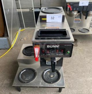 Bunn CWTF35 stainless steel coffee brewer with 4 warmer plates, hot water dispenser, and heavy-duty brew basket. Model CWTF35.