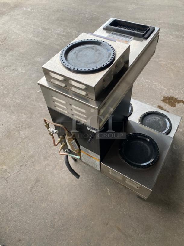 Bunn CW Series CWTF35 commercial coffee brewer, stainless steel, 4 warmer plates, hot water dispenser, heavy-duty brew basket.