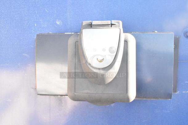 Southern Dimensions shell food trailer equipped with a locking system, ready for kitchen outfitting. Features Kenmore chest freezer.