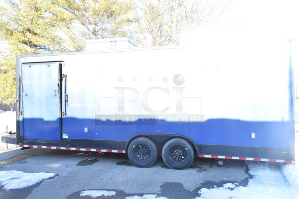 Southern Dimensions Shell Food Trailer, blue exterior, ready for customization, includes Kenmore chest freezer, Sub Zero insulation.
