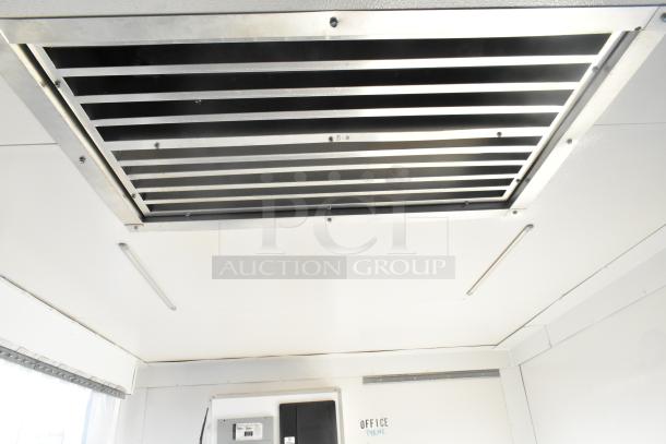 Interior view of Southern Dimensions Shell Food Trailer featuring a ceiling vent, insulated walls, and clear title details.