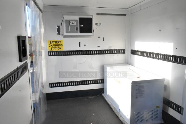 Southern Dimensions shell food trailer interior, ready for equipment. Features Kenmore chest freezer, battery charging station, and Sub Zero insulation.