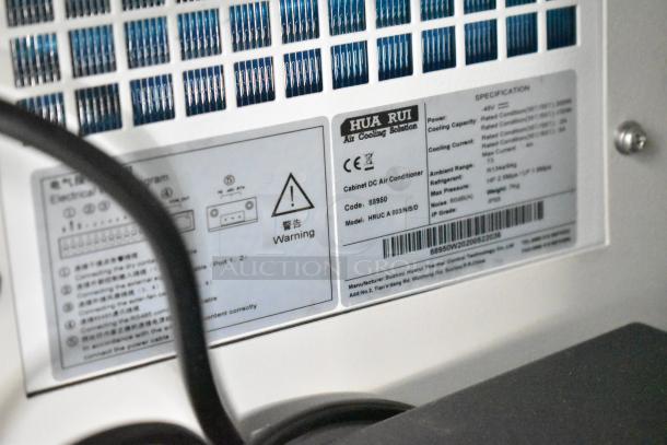 Label on Hua Rui air conditioner in Southern Dimensions shell food trailer. Model: HRUC A 003/N/S/D. Code: 88950.