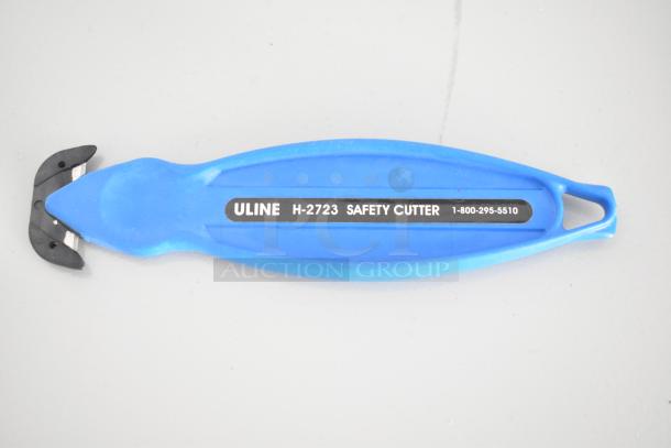 A blue Uline H-2723 safety cutter with black blade guard and contact details printed on the handle.
