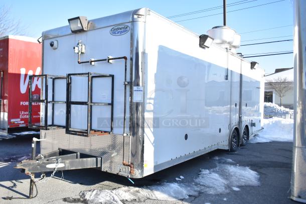 ATX 28' unbranded cold food trailer, features Arctic Air equipment, grease hood, clear title, snowy setting.