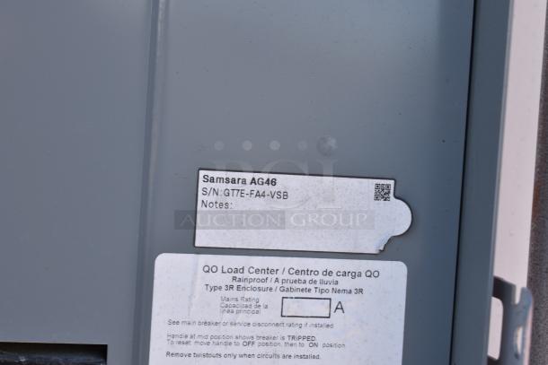 Close-up of equipment label on the ATX 28' food trailer, showing model Samsara AG46 and serial number GT7E-FA4-VSB.