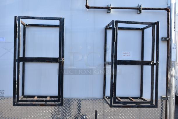 ATX 28' unbranded fully outfitted cold food trailer exterior, showing metal framing and pipe fixtures. Clear title available.