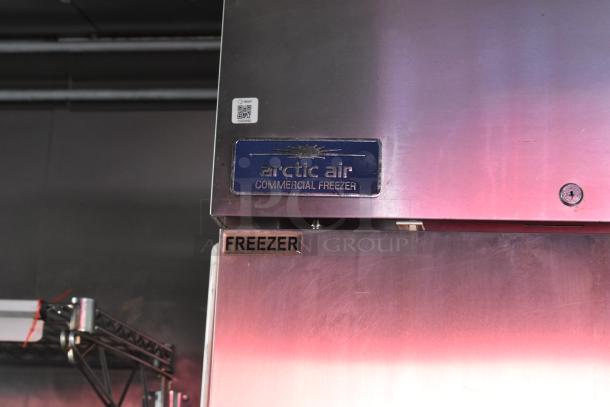 Arctic Air commercial freezer with logo and "FREEZER" label, part of a fully equipped ATX 28' cold food trailer.