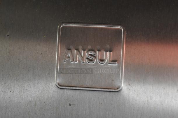 "ANSUL" suppression system marking on metal surface of 28' ATX food and beverage trailer equipped with commercial-grade kitchen appliances.
