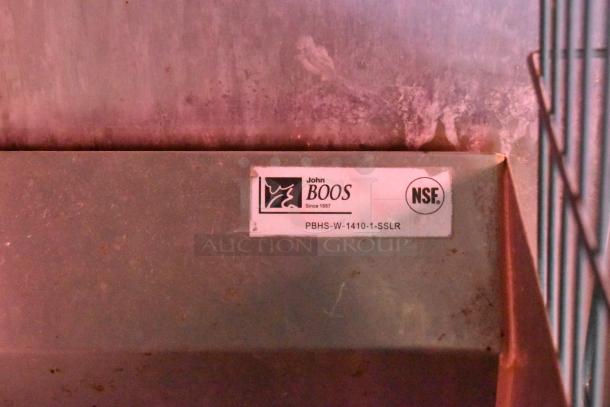 Label on metal surface, showing "John Boos" logo and model number PBHS-W-1410-1-SSLR, NSF certified.