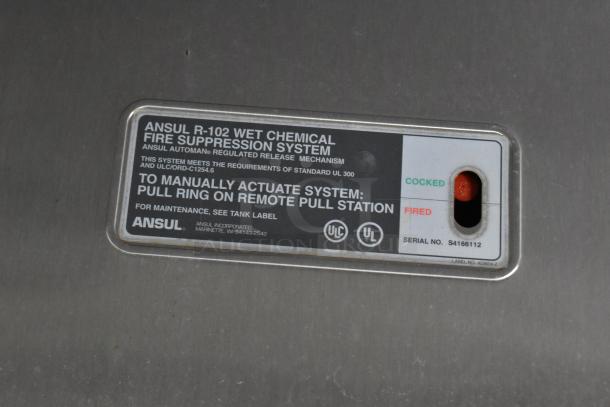 "Ansul R-102 Wet Chemical Fire Suppression System label on ATX unbranded trailer. Indicates status and serial number S4166112."