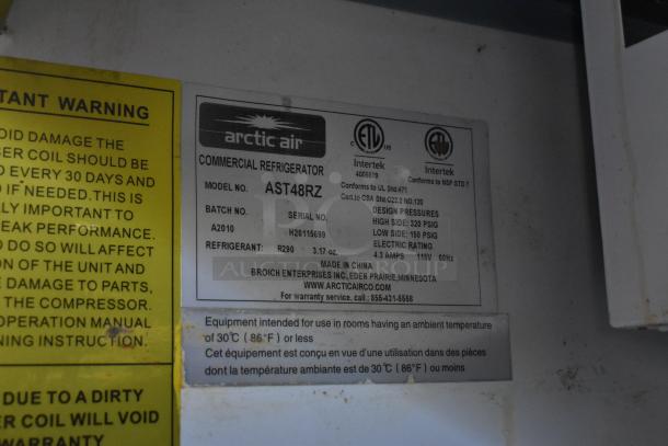 Commercial refrigerator label: Arctic Air AST48RZ, refrigerant R290, 3.17 oz; serial H201115699, 4.3 amps, 115V, 60Hz.