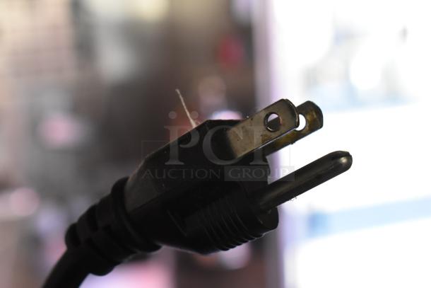 Close-up of a power plug from the ATX 28' food trailer, featuring commercial-grade equipment, 2020 model.