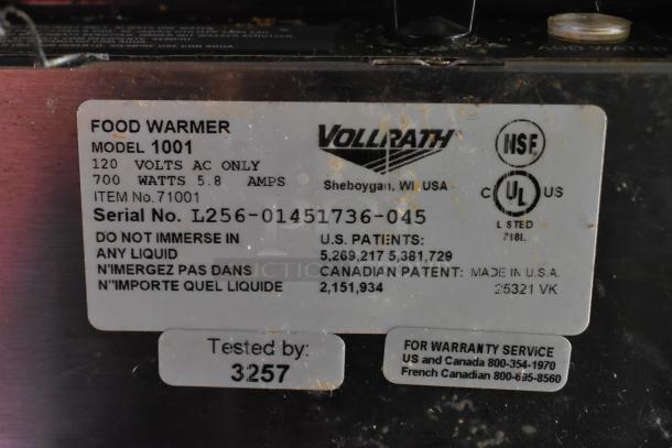 Label on food warmer details model 1001, 120V, 700W, 5.8A, item no. 71001, serial no. L256-01451736-045, made by Vollrath.