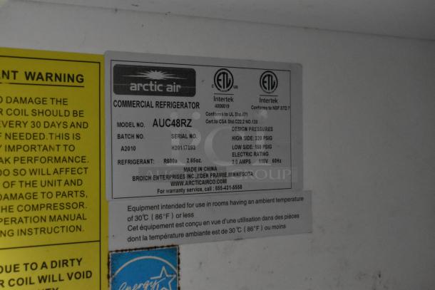 Arctic Air commercial refrigerator label, model AUC48RZ, details specifications like refrigerant type, electric rating, and design pressures.