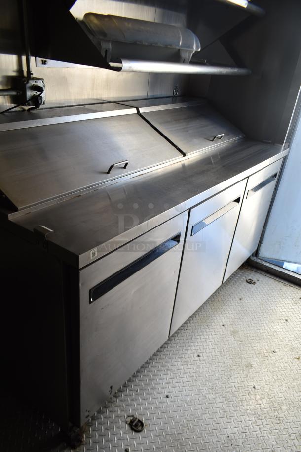 ATX 28' unbranded trailer interior with Arctic Air prep tables, stainless steel surfaces, and commercial-grade equipment.