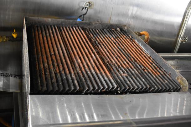 Asber charbroiler with used grill surface, part of a 28' ATX food trailer, featuring commercial-grade equipment.