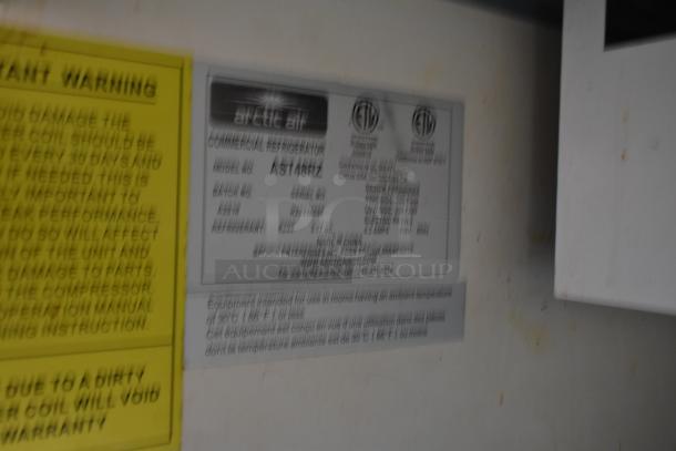 Label of Arctic Air Commercial Refrigerator, Model AST48RZ, showing specs and warnings.