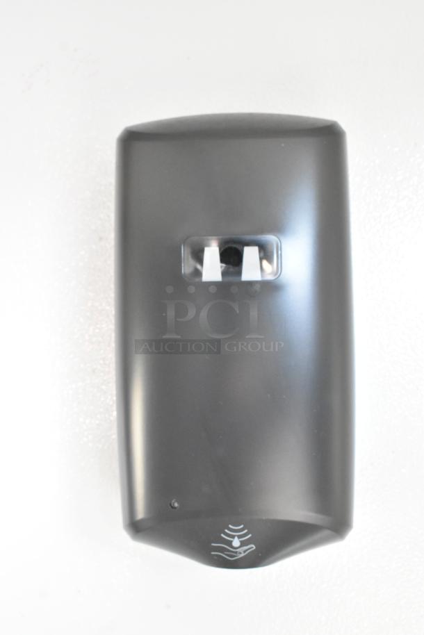 Unbranded sensor-activated liquid soap dispenser with sleek black casing, ideal for commercial use.