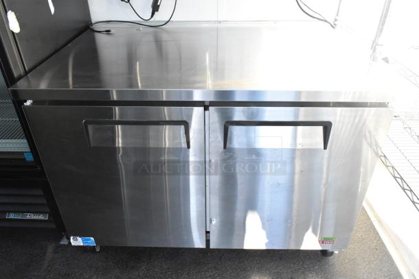 Fully equipped unbranded food trailer with True freezer, cooler merchandisers, Turbo Air coolers, sinks. Clear title.