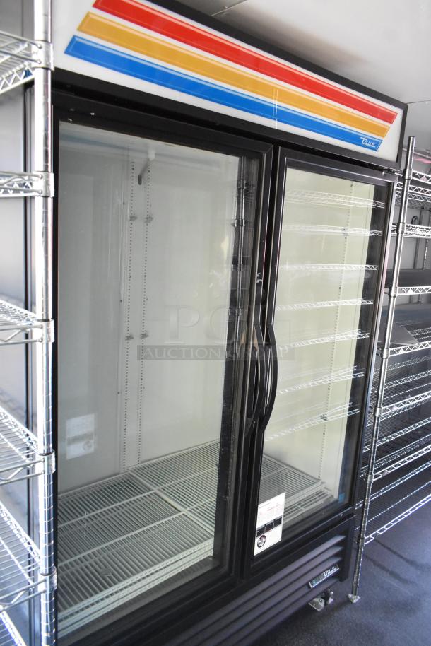 Unbranded fully outfitted cold food trailer with True cooler merchandisers and commercial grade equipment.