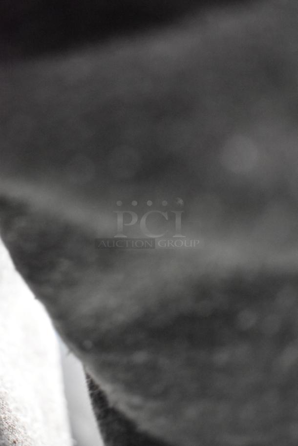 A blurred image with indistinguishable details. Unable to describe the auction item.