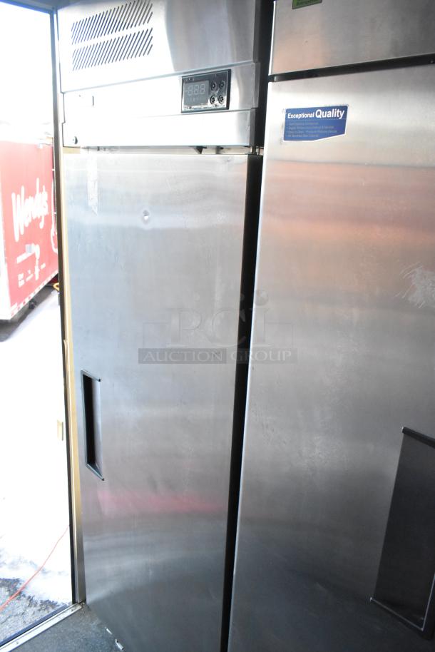 Unbranded 2021 cold food trailer interior with commercial True freezer and cooler merchandisers. Like-new condition.