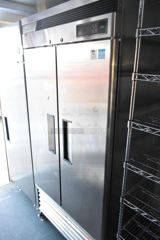 Unbranded cold food and beverage trailer with Turbo Air Deluxe Freezer, True Merchandisers, shelving, sold with clear title.