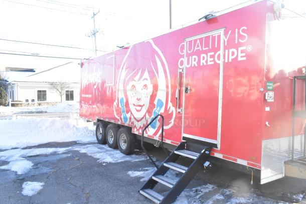 Brand new 2021 Titanium Cargo 28' food trailer with Wendy's branding. Equipped with a security system; ready for customization. Clear title.