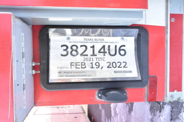 Texas buyer license plate on a 2021 Titanium Cargo 28' food trailer. Expires Feb 19, 2022. VIN: 7PLBC2838NM000934.
