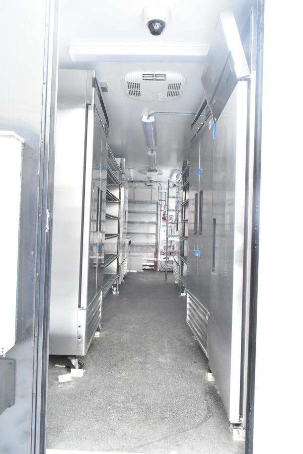 New 2021 unbranded cold food/beverage retail trailer, equipped with Turbo Air coolers, True coolers, sinks, and POS system.