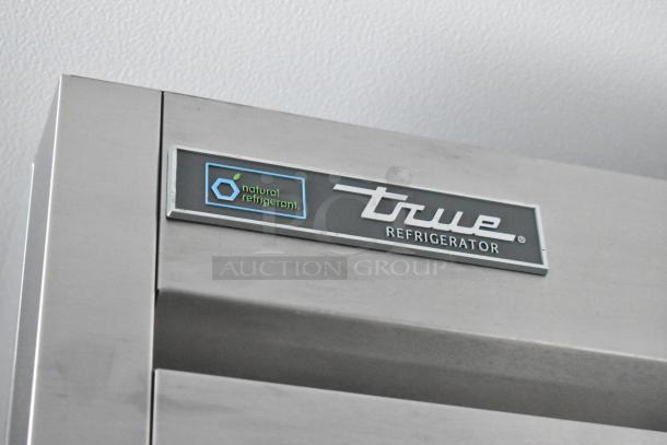 True Refrigerator label indicating natural refrigerant use on cold food and beverage trailer.