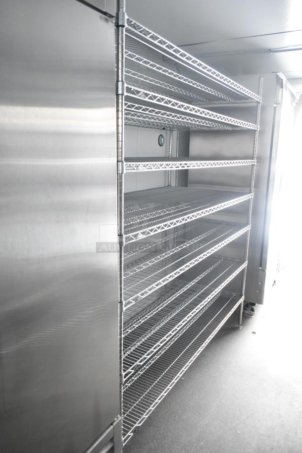 Unbranded cold food and beverage trailer with stainless steel shelving and Turbo Air coolers, ideal for retail or ghost kitchen use.