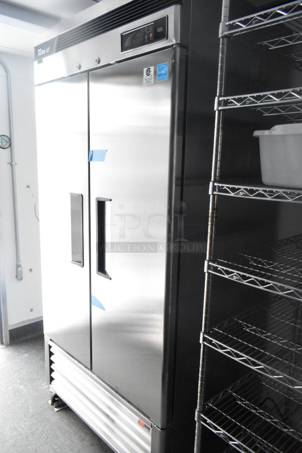 Unbranded retail trailer with Turbo Air cooler, True cooler, wire shelving. Ideal for cold food/beverage service. New condition.