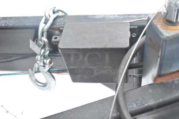 Trailer hitch with ESCO box and chain. Ideal for cold food and retail. Features Turbo Air and True Coolers. Clear title.