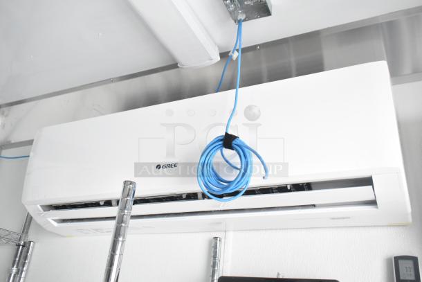 Gree commercial air conditioning unit installed in a 2021 Nationwide 24' shell food trailer, ready for kitchen setup.